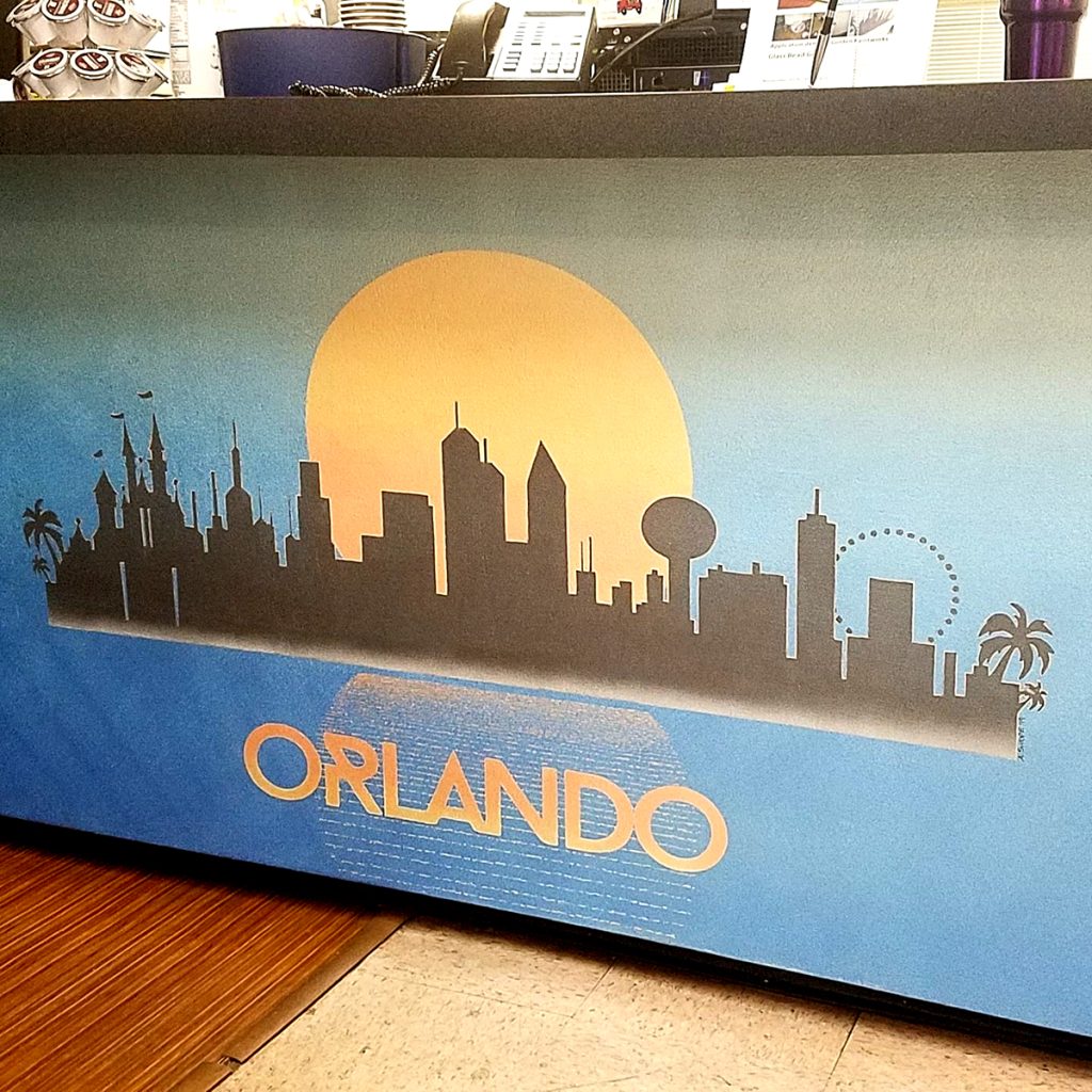 This Orlando skyline mural was painted using hand-cut stencils and Golden Paintworks Metallics, then topped with GPW Glass Bead Gel.